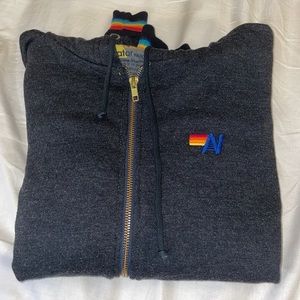 Worn maybe once or twice. In new condition - super soft and comfortable! Trendy!